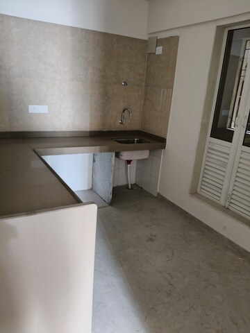 Kitchen in 2 BHK Apartment at Dosti West County, Balkum Pada – for Rent