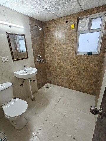 Bathroom in 3 BHK Apartment at Antriksh Golf Link, Sector 1 Greater Noida – for Rent