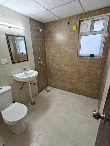 Bathroom in 3 BHK Apartment at Antriksh Golf Link, Sector 1 Greater Noida – for Rent