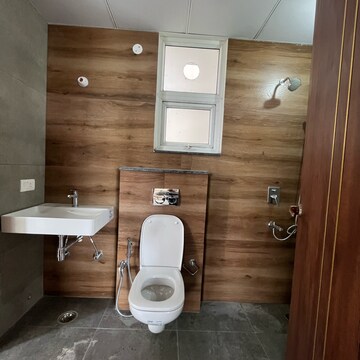 Bathroom in 3 BHK Apartment at Malwa Escon Primera, International Airport Road – for Rent