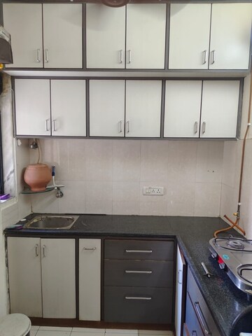 Kitchen in 2 BHK Apartment at Maruti Tower Vashi, Vashi Sector 15 – for Rent