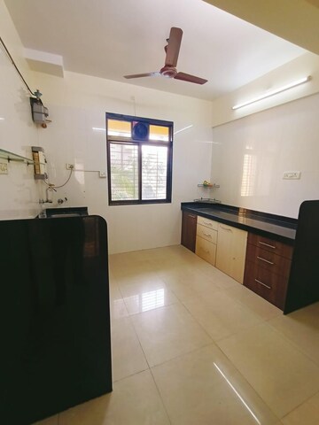 Kitchen in 4 BHK Apartment at Radhakunj CHS Chembur, Chembur – for Sale