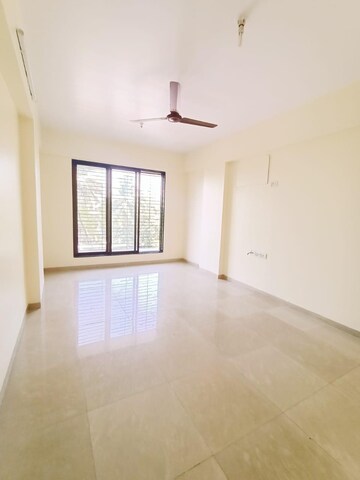 Living Room in 4 BHK Apartment at Radhakunj CHS Chembur, Chembur – for Sale