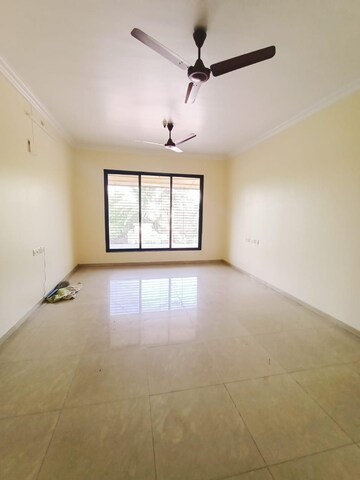 Living Room in 4 BHK Apartment at Radhakunj CHS Chembur, Chembur – for Sale