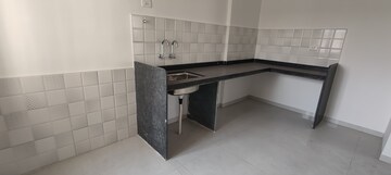Kitchen in 2.5 BHK Apartment at Wakadkar Aster Park, Jambhe – for Sale