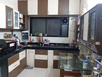 Kitchen in 2 BHK Apartment at Harshal Palace, Anand Nagar Chinchwad – for Sale