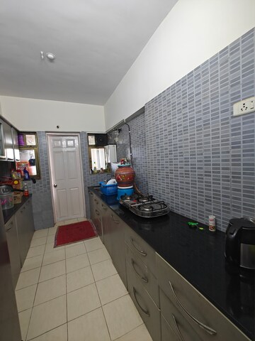 Kitchen in 2 BHK Apartment at NRI Complex Phase 2, Seawoods – for Rent