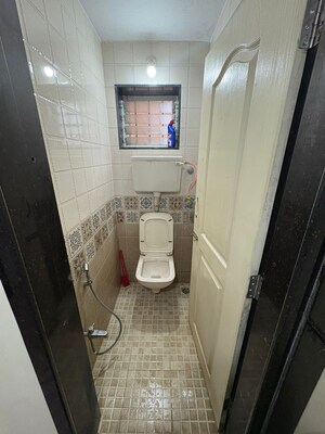 Bathroom in 1 BHK Apartment at Shubharambh Complex, Manpada – for Sale