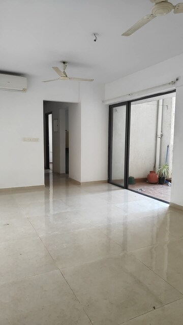 Living Room in 2 BHK Apartment at Lodha Lakeshore Greens, Dombivli East – for Sale