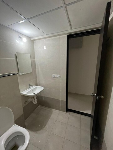 Bathroom in 2 BHK Apartment at Paranjape Blue Ridge, Hinjewadi – for Rent