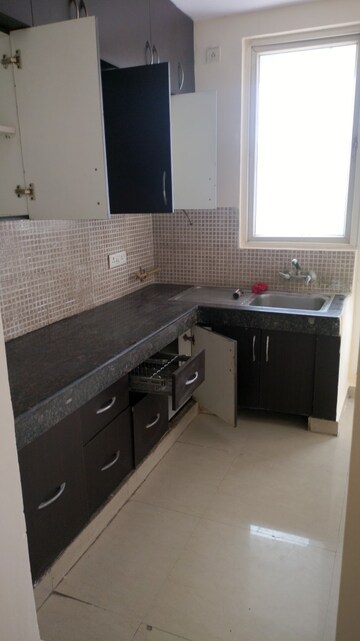 Kitchen in 2 BHK Apartment at Great Value Sharanam, Sector 107 – for Rent