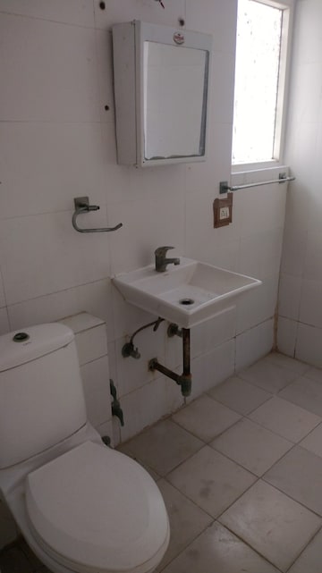Bathroom in 4 BHK Apartment at Great Value Sharanam, Sector 107 – for Rent