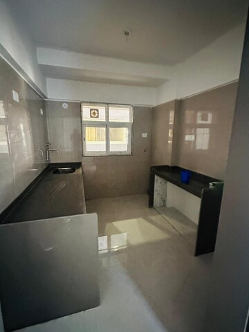 Kitchen in 2 BHK Apartment at Vaibhavlaxmi Queens Avenue, Chembur – for Rent