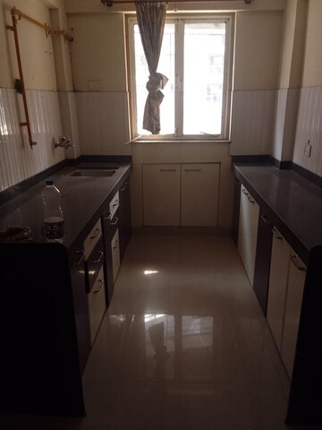 Kitchen in 2 BHK Apartment at Karmvir Avant Sky Villa, Goregaon East – for Rent