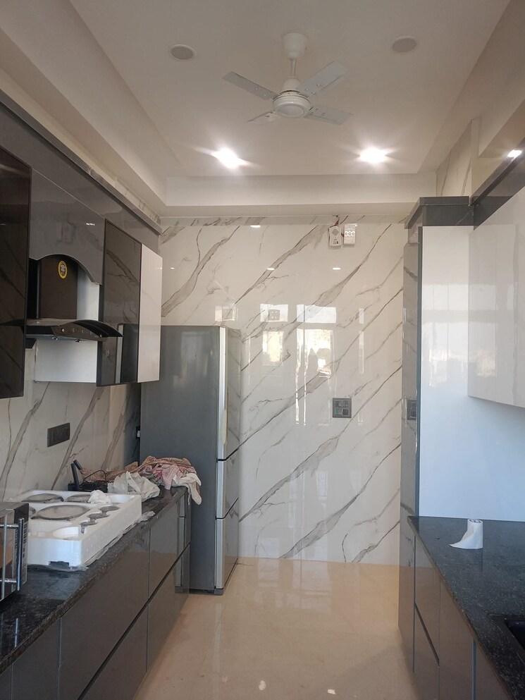 Kitchen, shapoorji-pallonji-joyville-phase-2 4 Bedroom 2162 Sq.Ft. Apartment In Sector 102 Gurgaon 9163401