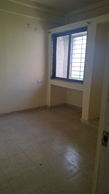 Master Bedroom in 1 BHK Apartment at Megh Malhar Co-op Housing Society, Ghansoli – for Rent