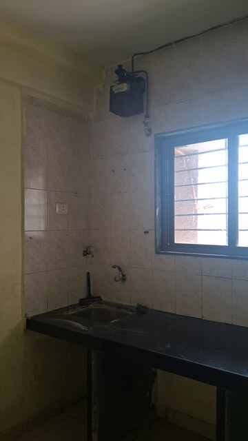 Kitchen in 1 BHK Apartment at Megh Malhar Co-op Housing Society, Ghansoli – for Rent