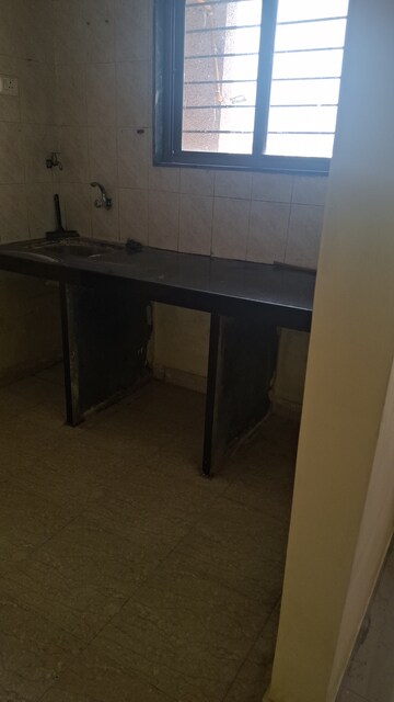 Kitchen in 1 BHK Apartment at Megh Malhar Co-op Housing Society, Ghansoli – for Rent