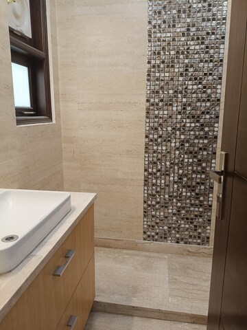 Bathroom in 4 BHK Builder Floor at New Friends Colony – for Rent