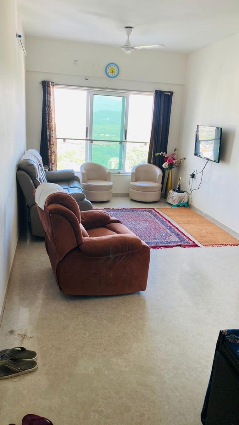 Living Room, romell-aether 2 Bedroom 709 Sq.Ft. Apartment In Goregaon East Mumbai 9163606