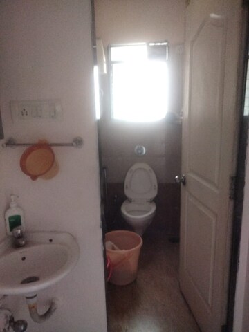 Bathroom in 2 BHK Apartment at Hubtown Greenwoods, Vartak Nagar – for Sale