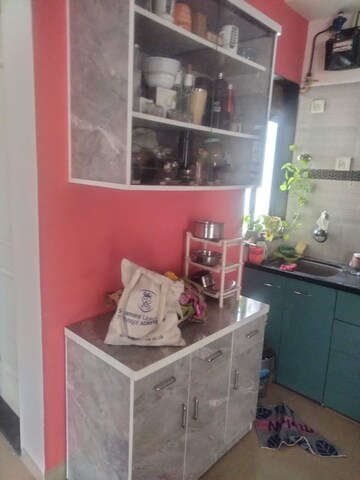 Kitchen in 2 BHK Apartment at Hubtown Greenwoods, Vartak Nagar – for Sale