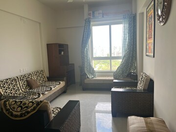 Living Room in 1 BHK Apartment at Nyati Era, Dhanori – for Rent