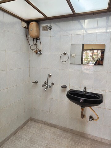 Bathroom in 3 BHK Apartment at Dhruv Heights, Malad East – for Rent