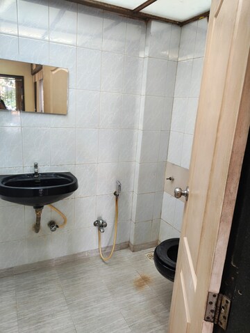 Bathroom in 3 BHK Apartment at Dhruv Heights, Malad East – for Rent