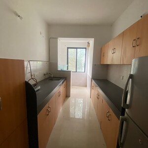 Kitchen in 2 BHK Apartment at Montvert Finesse Apartment, Link Road – for Sale