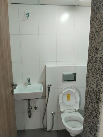 Bathroom in 1 BHK Apartment at Godrej Nirvaan, Themghar – for Rent