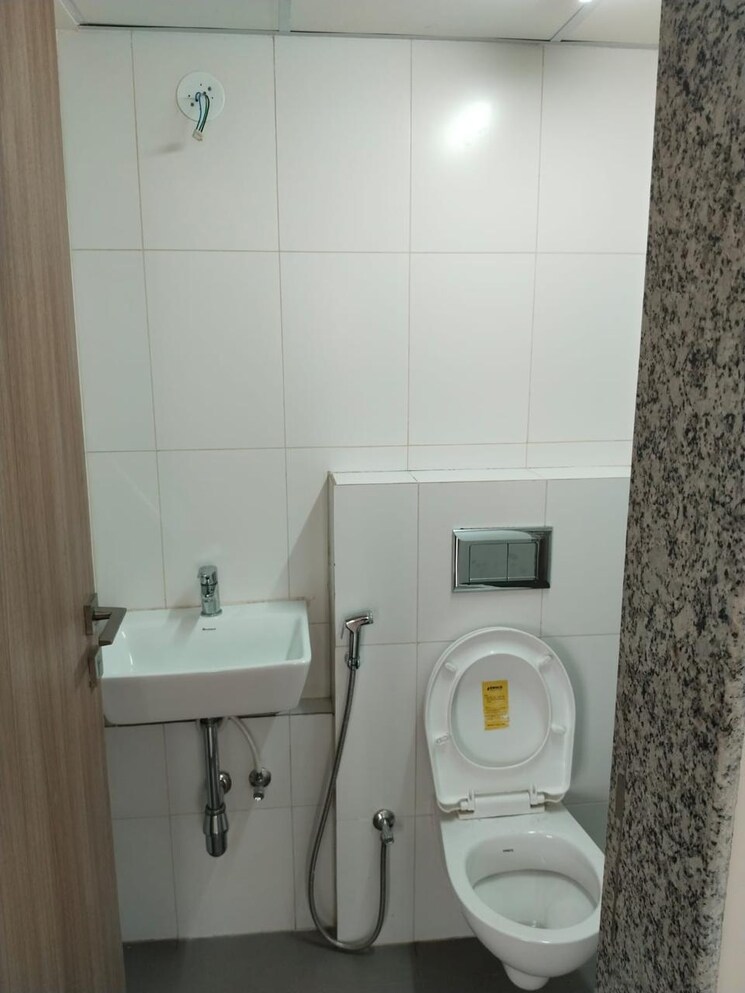 Bathroom, godrej-nirvaan 1 Bedroom 419 Sq.Ft. Apartment In Themghar Thane 9163793