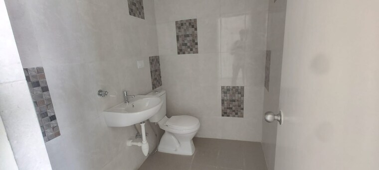 Bathroom, godrej-nirvaan 2 Bedroom 591 Sq.Ft. Apartment In Themghar Thane 9163798