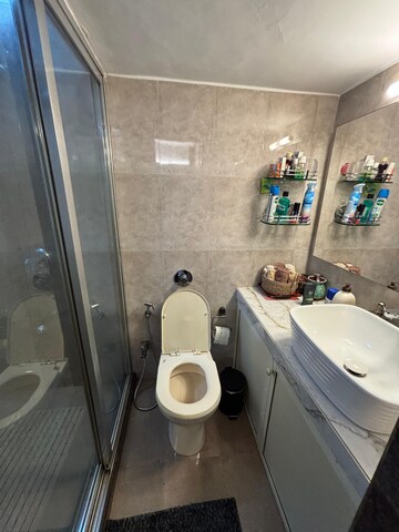 Bathroom in 2 BHK Apartment at Parijat CHS Andheri West, Yari Road – for Rent