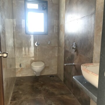 Bathroom in 2 BHK Apartment at Glasswood Om Sarjan CHSL, Dalvi Nagar – for Sale