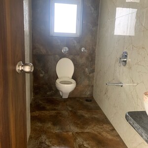 Bathroom in 2 BHK Apartment at Glasswood Om Sarjan CHSL, Dalvi Nagar – for Sale