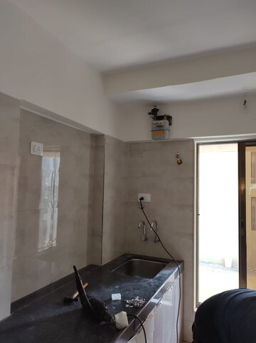 Kitchen in 2 BHK Apartment at K L Lotus Niwas Satya Niwas, Malad West – for Rent