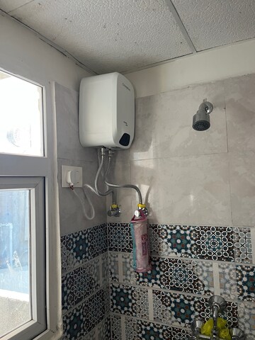 Bathroom in 1 BHK Apartment at Signature Global Golf Greens, Sector 79 – for Rent