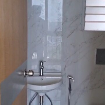 Bathroom in 1 BHK Apartment at Ruparel Nova, Police Line – for Rent
