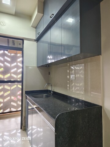 Kitchen in 2.5 BHK Apartment at Lodha Palava Downtown, Dombivli East – for Sale