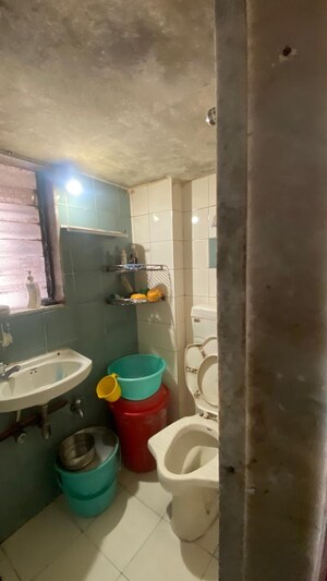 Bathroom in 1 BHK Apartment at Divya Gunjan CHS, Kandivali West – for Sale