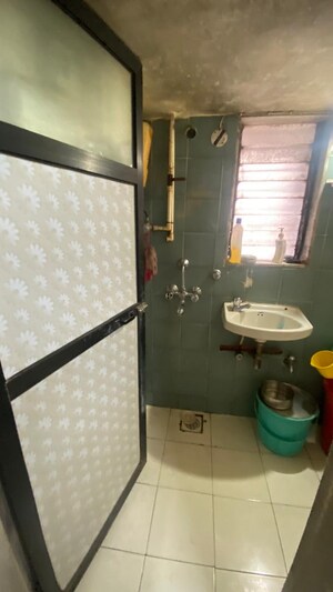 Kitchen in 1 BHK Apartment at Divya Gunjan CHS, Kandivali West – for Sale