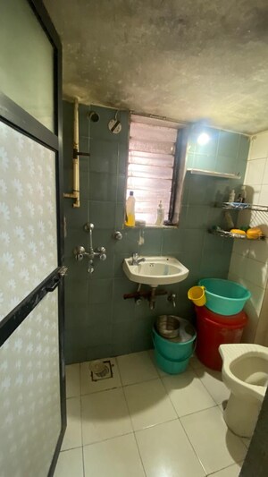 Team Area in 1 BHK Apartment at Divya Gunjan CHS, Kandivali West – for Sale