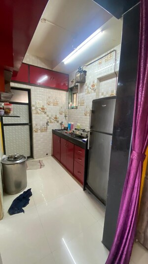 Kitchen in 1 BHK Apartment at Divya Gunjan CHS, Kandivali West – for Sale