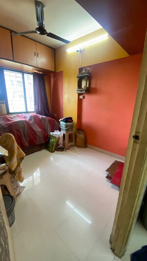 Room in 1 BHK Apartment at Divya Gunjan CHS, Kandivali West – for Sale