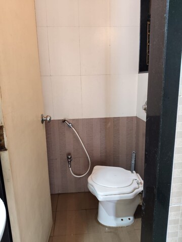 Bathroom in 1 BHK Apartment at Nisarg Hyde Park, Kharghar – for Rent