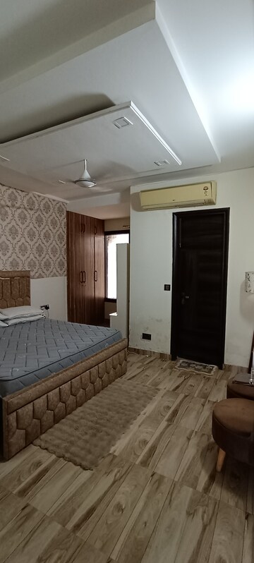Bedroom in 3 BHK Builder Floor at Ansal API Esencia, Sector 67 – for Rent