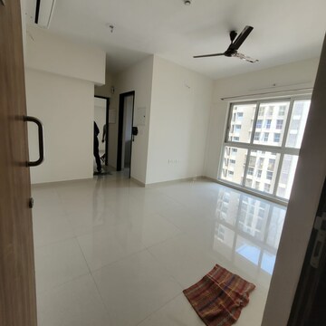 Living Room in 1 BHK Apartment at Lodha Amara, Kolshet Road – for Rent