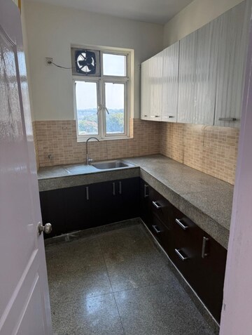 Kitchen in 2 BHK Apartment at Raheja Atharva, Sector 109 – for Rent