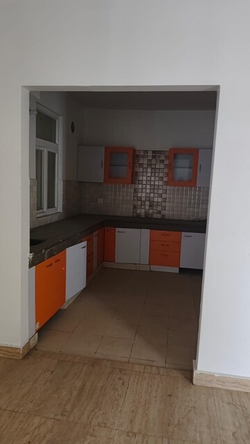 Kitchen in 2 BHK Apartment at Tulsiani Luvnest, Vrindavan Yojna – for Rent